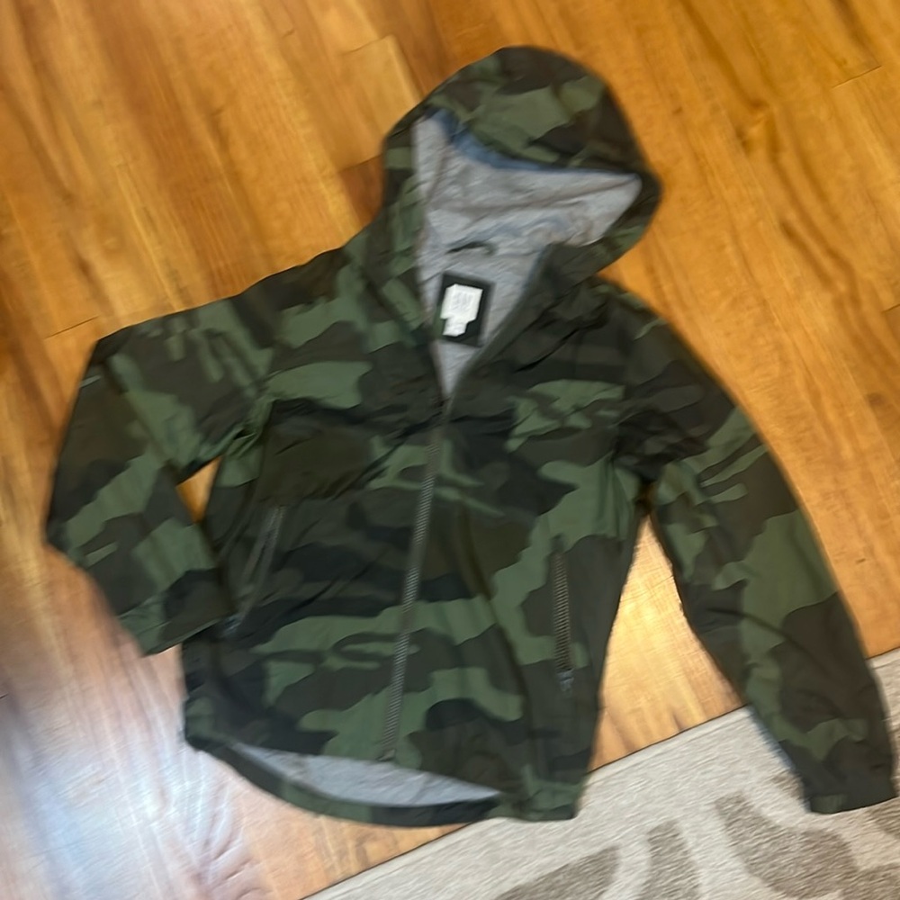 Gap youth large windbreaker/ rain coat. Green camouflage
